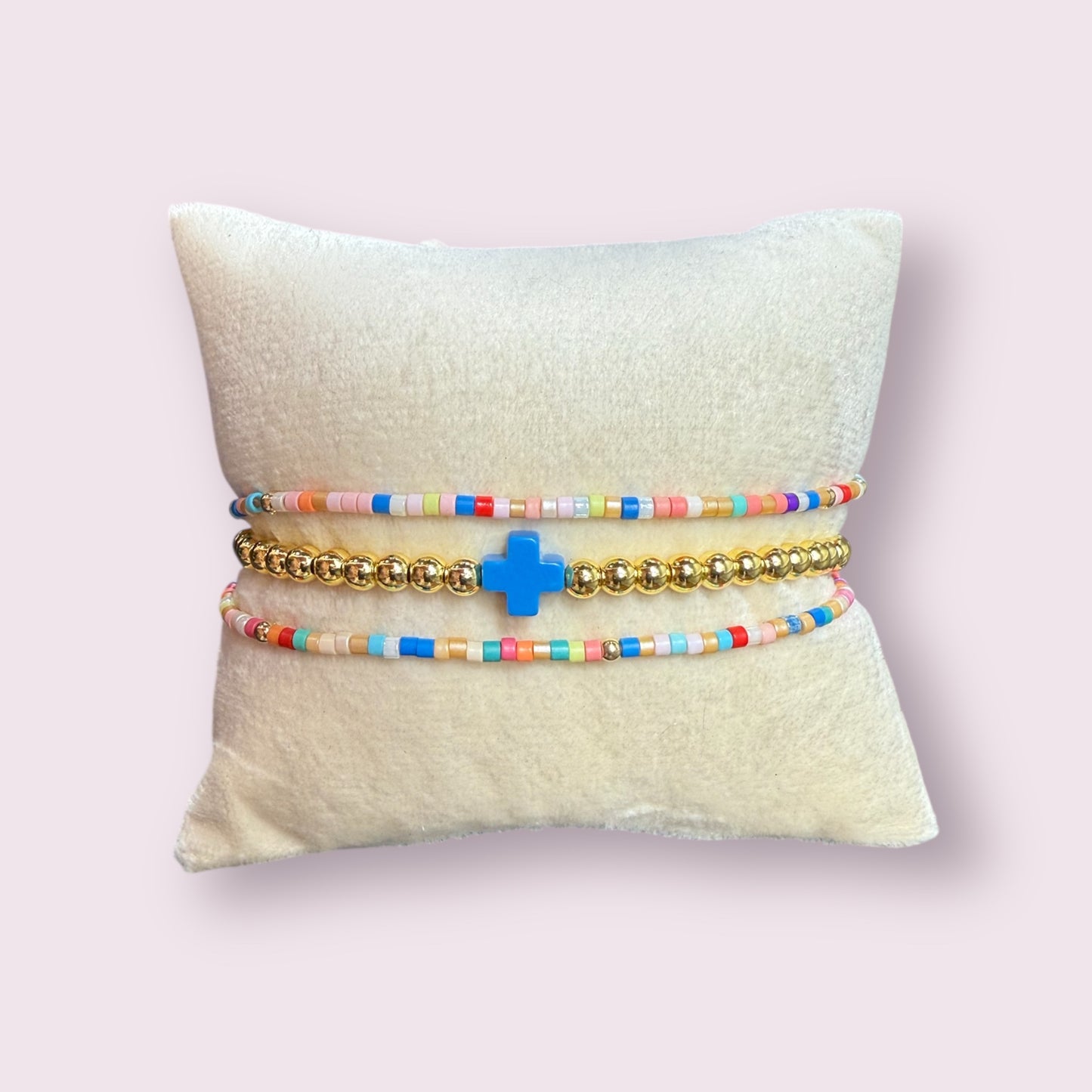Blue/orange pastel cross bracelet set