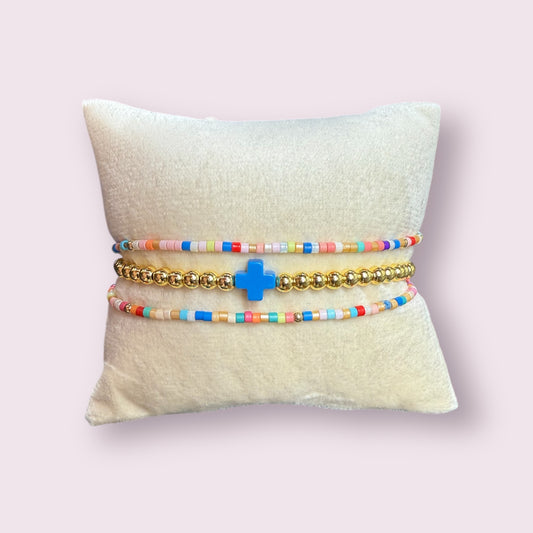 Blue/orange pastel cross bracelet set
